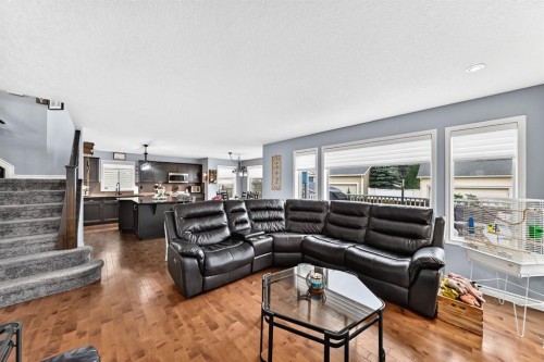 116 Kingsland Court Se, Airdrie, AB - Indoor Photo Showing Living Room