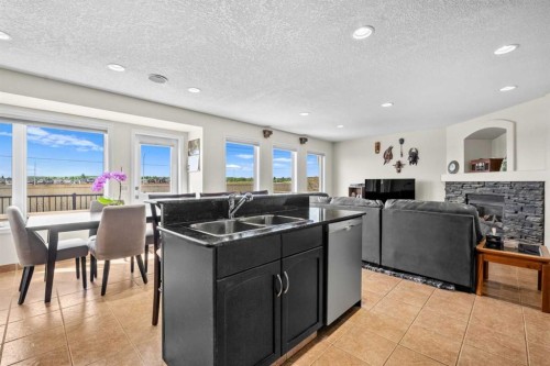 184 Somerglen Common Sw, Calgary, AB - Indoor With Fireplace