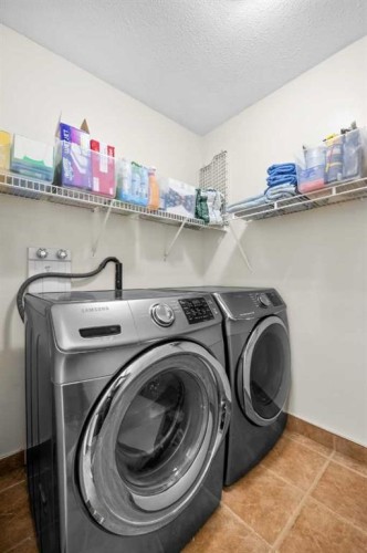184 Somerglen Common Sw, Calgary, AB - Indoor Photo Showing Laundry Room