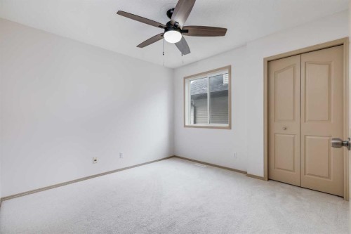 35 New Brighton Manor Se, Calgary, AB - Indoor Photo Showing Other Room