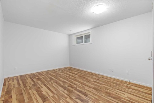 35 New Brighton Manor Se, Calgary, AB - Indoor Photo Showing Other Room