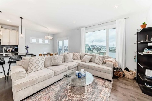 51 Evanscrest Way Nw, Calgary, AB - Indoor Photo Showing Living Room With Fireplace