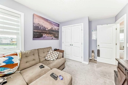 51 Evanscrest Way Nw, Calgary, AB - Indoor Photo Showing Living Room