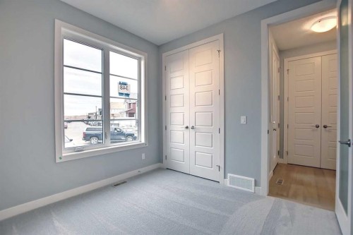 2085 Cobblespring Avenue Sw, Airdrie, AB - Indoor Photo Showing Other Room