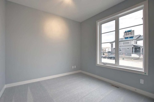 2085 Cobblespring Avenue Sw, Airdrie, AB - Indoor Photo Showing Other Room