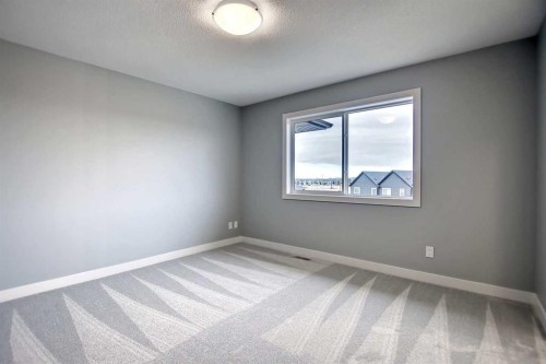 2085 Cobblespring Avenue Sw, Airdrie, AB - Indoor Photo Showing Other Room