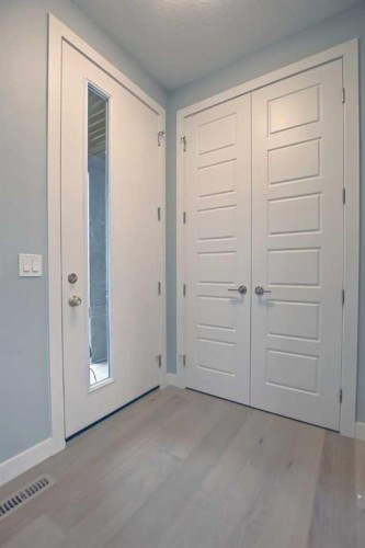 2085 Cobblespring Avenue Sw, Airdrie, AB - Indoor Photo Showing Garage