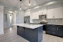 2085 Cobblespring Avenue Sw, Airdrie, AB  - Indoor Photo Showing Kitchen With Stainless Steel Kitchen With Upgraded Kitchen 