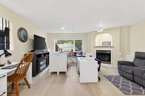 130 Harvest Park Circle Ne, Calgary, AB - Indoor Photo Showing Living Room With Fireplace