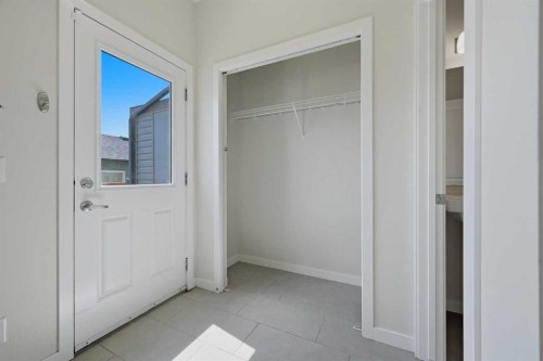 7 Belgian Link, Cochrane, AB - Indoor Photo Showing Other Room