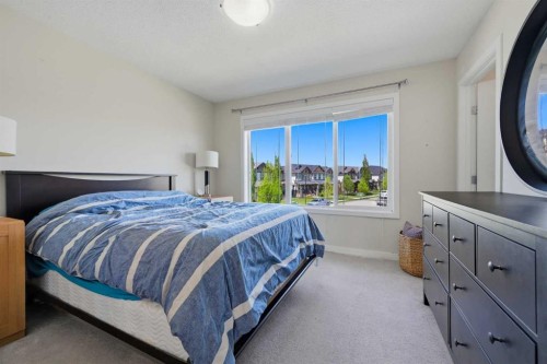 7 Belgian Link, Cochrane, AB - Indoor Photo Showing Bedroom