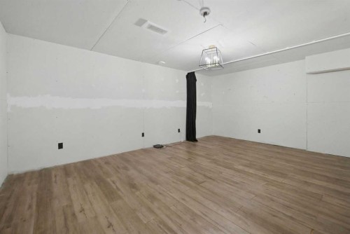 7 Belgian Link, Cochrane, AB - Indoor Photo Showing Other Room
