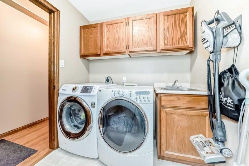71 Edenwold Place Nw, Calgary, AB - Indoor Photo Showing Laundry Room