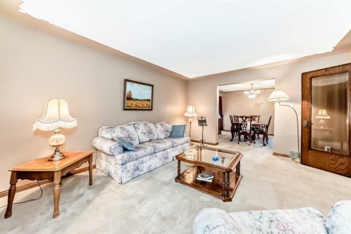 71 Edenwold Place Nw, Calgary, AB - Indoor Photo Showing Living Room