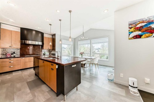 11 Cresthaven Bay Sw, Calgary, AB - Indoor Photo Showing Kitchen With Upgraded Kitchen