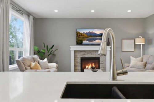 64 Panton Heights Nw, Calgary, AB - Indoor With Fireplace