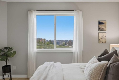 64 Panton Heights Nw, Calgary, AB - Indoor Photo Showing Bedroom