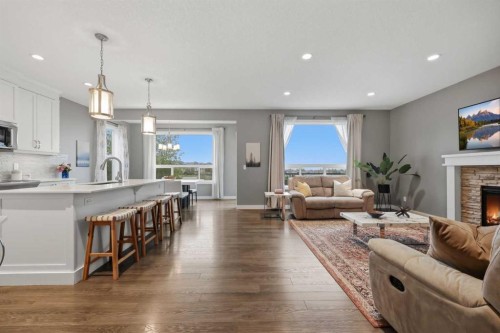 64 Panton Heights Nw, Calgary, AB - Indoor With Fireplace