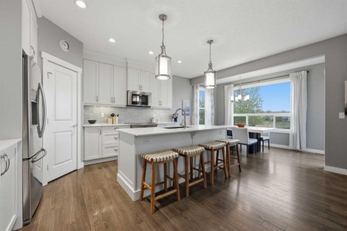 64 Panton Heights Nw, Calgary, AB - Indoor Photo Showing Kitchen With Upgraded Kitchen