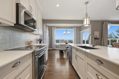 64 Panton Heights Nw, Calgary, AB - Indoor Photo Showing Kitchen With Double Sink With Upgraded Kitchen