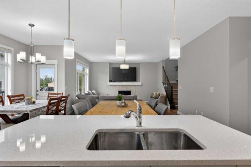 109 Kinniburgh Cove, Chestermere, AB - Indoor Photo Showing Kitchen With Double Sink
