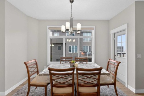 109 Kinniburgh Cove, Chestermere, AB - Indoor Photo Showing Dining Room