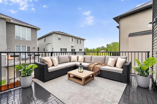 109 Kinniburgh Cove, Chestermere, AB - Outdoor With Deck Patio Veranda With Exterior