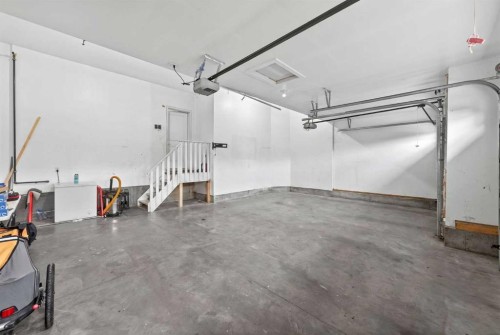 109 Kinniburgh Cove, Chestermere, AB - Indoor Photo Showing Garage