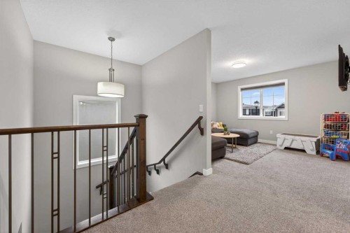 109 Kinniburgh Cove, Chestermere, AB - Indoor Photo Showing Other Room