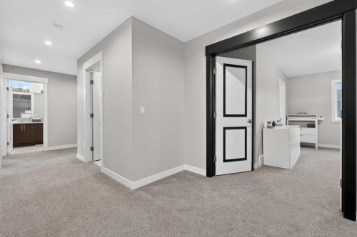 109 Kinniburgh Cove, Chestermere, AB - Indoor Photo Showing Other Room