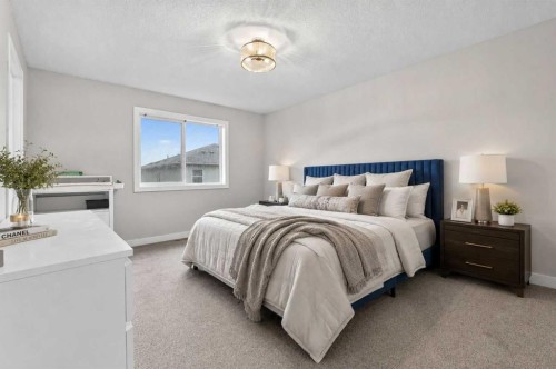 109 Kinniburgh Cove, Chestermere, AB - Indoor Photo Showing Bedroom