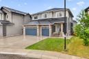 109 Kinniburgh Cove, Chestermere, AB  - Outdoor With Facade 