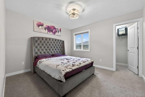109 Kinniburgh Cove, Chestermere, AB - Indoor Photo Showing Bedroom