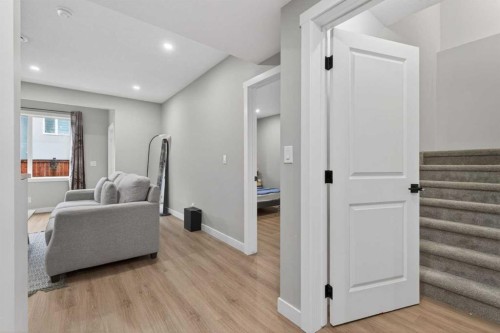 109 Kinniburgh Cove, Chestermere, AB - Indoor Photo Showing Other Room