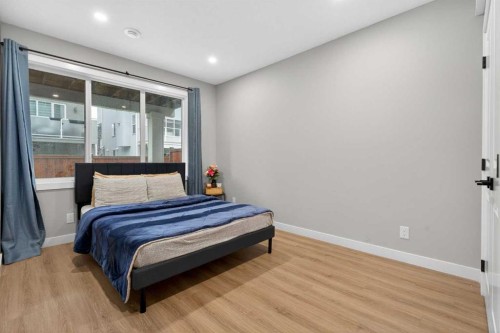 109 Kinniburgh Cove, Chestermere, AB - Indoor Photo Showing Bedroom