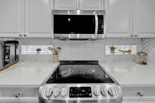 907 Cimarron Park Close South, Okotoks, AB 