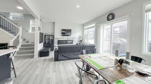 67 Setonstone Row Se, Calgary, AB - Indoor With Fireplace
