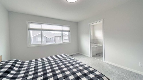 67 Setonstone Row Se, Calgary, AB - Indoor Photo Showing Bedroom