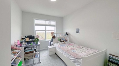67 Setonstone Row Se, Calgary, AB - Indoor Photo Showing Bedroom