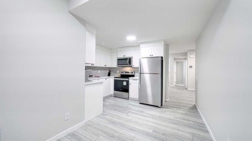 67 Setonstone Row Se, Calgary, AB - Indoor Photo Showing Kitchen With Stainless Steel Kitchen