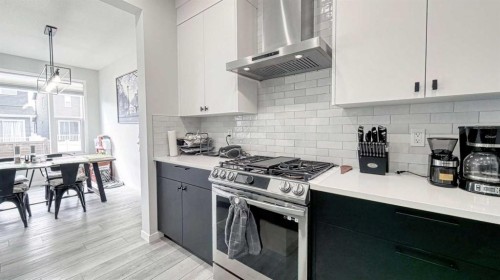 67 Setonstone Row Se, Calgary, AB - Indoor Photo Showing Kitchen With Upgraded Kitchen