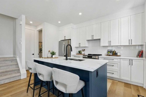 3-440 32 Avenue Nw, Calgary, AB - Indoor Photo Showing Kitchen With Double Sink With Upgraded Kitchen