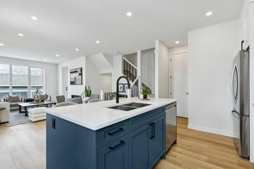 3-440 32 Avenue Nw, Calgary, AB - Indoor Photo Showing Kitchen With Double Sink With Upgraded Kitchen