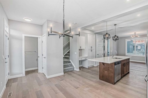 2081 Cobblespring Avenue Sw, Airdrie, AB - Indoor Photo Showing Kitchen