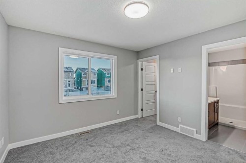2081 Cobblespring Avenue Sw, Airdrie, AB - Indoor Photo Showing Other Room