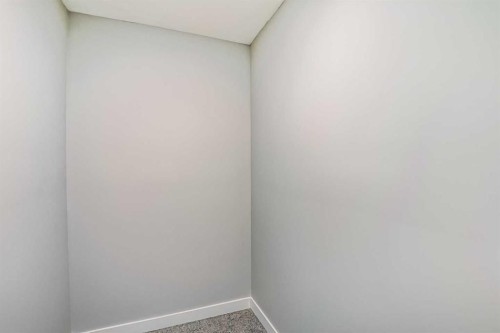2081 Cobblespring Avenue Sw, Airdrie, AB - Indoor Photo Showing Other Room