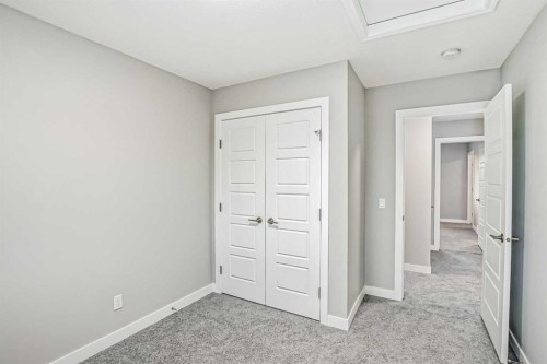2081 Cobblespring Avenue Sw, Airdrie, AB - Indoor Photo Showing Other Room