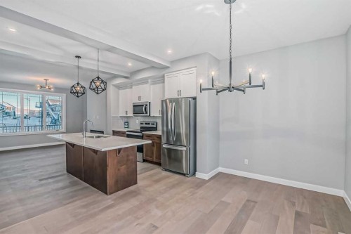 2081 Cobblespring Avenue Sw, Airdrie, AB - Indoor Photo Showing Kitchen With Stainless Steel Kitchen With Upgraded Kitchen