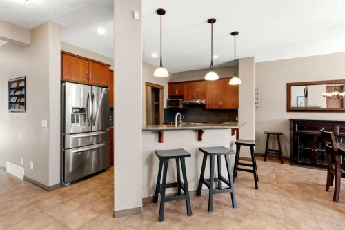 23 Aspen Stone Crescent Sw, Calgary, AB - Indoor Photo Showing Kitchen