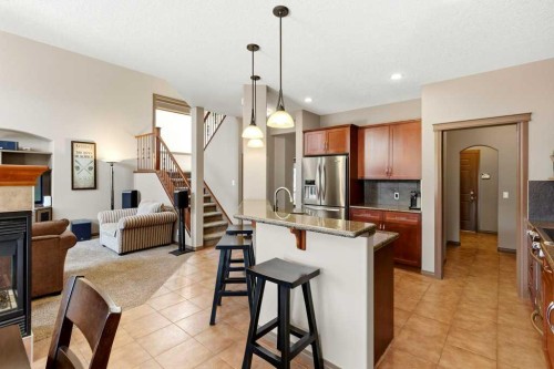 23 Aspen Stone Crescent Sw, Calgary, AB - Indoor With Fireplace